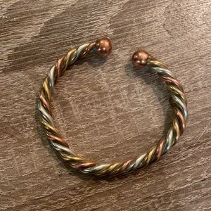 Copper twisted cuff bracelet.